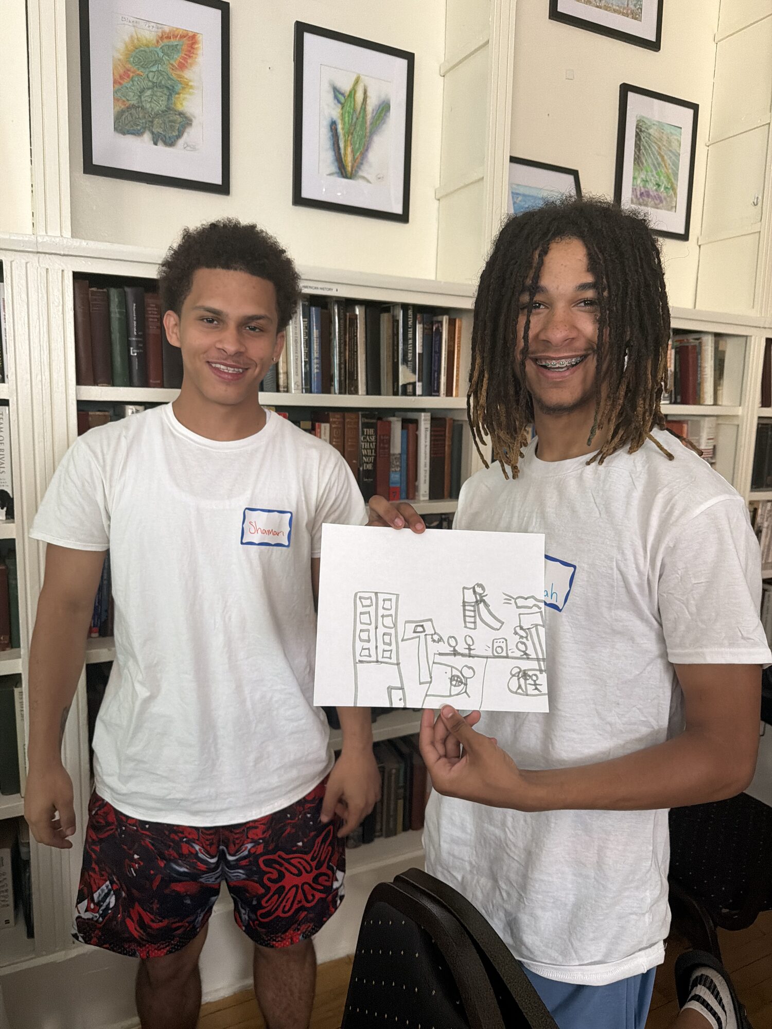 Participants sharing their drawings during a reflection exercise